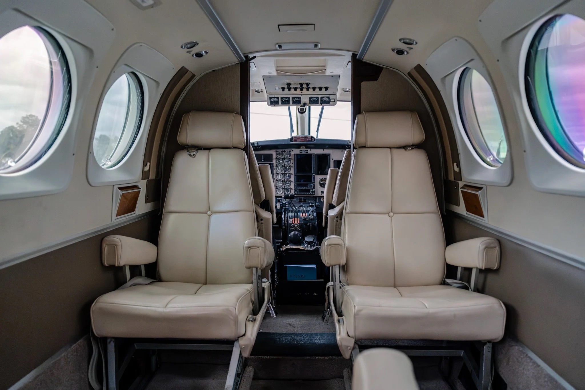 Aircraft cabin interior with cream leather seating