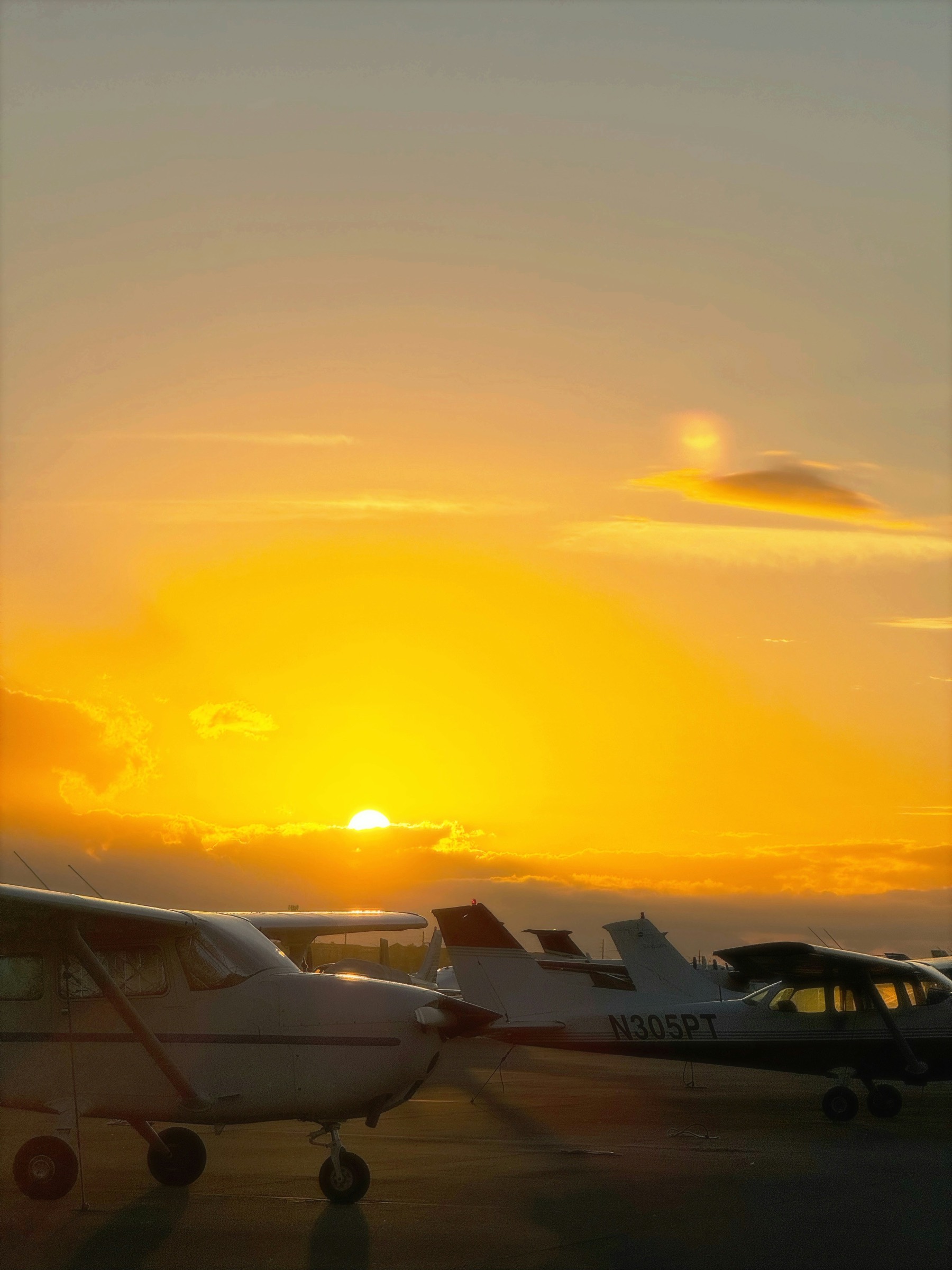 Aircraft on the apron at sunset